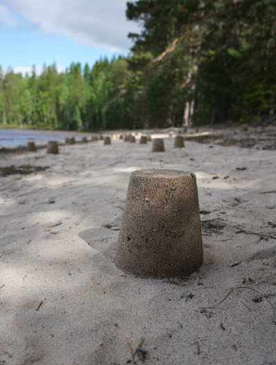 Kakutus sand sculpture action at Haukanhieta beach, Helvetinjärvi national park, Finland Kakutus, Haukanhieta beach, Helvetinjärvi, Finland, 2018